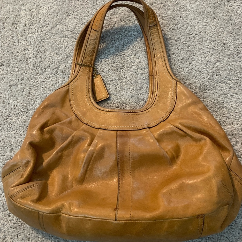 Tan Coach purse gently worn